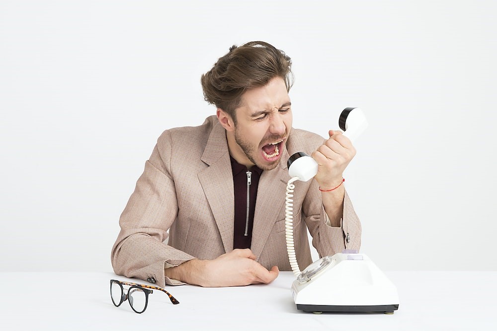 Man yelling at phone