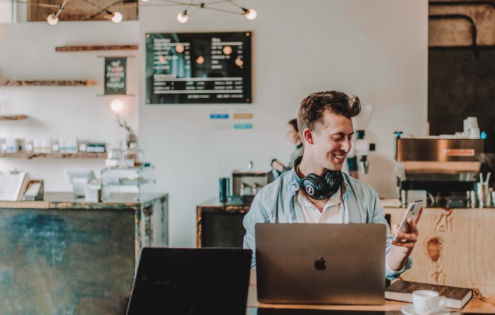 Software developer working at cafe